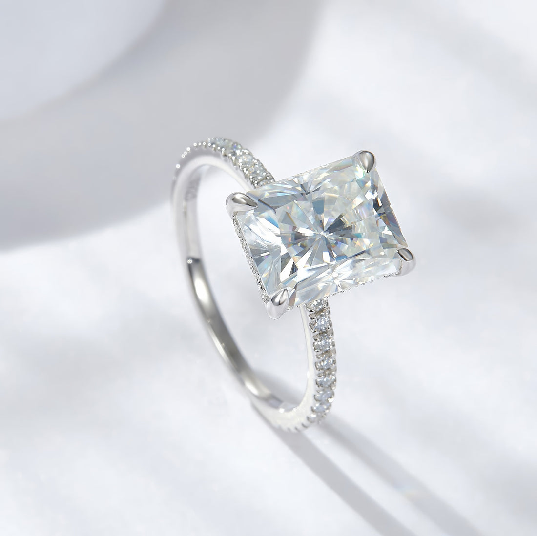 Dainty radiant-cut moissanite engagement ring set in 925 sterling silver