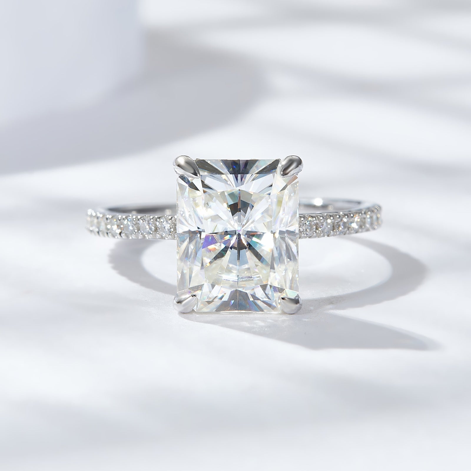 Dainty radiant-cut moissanite engagement ring set in 925 sterling silver