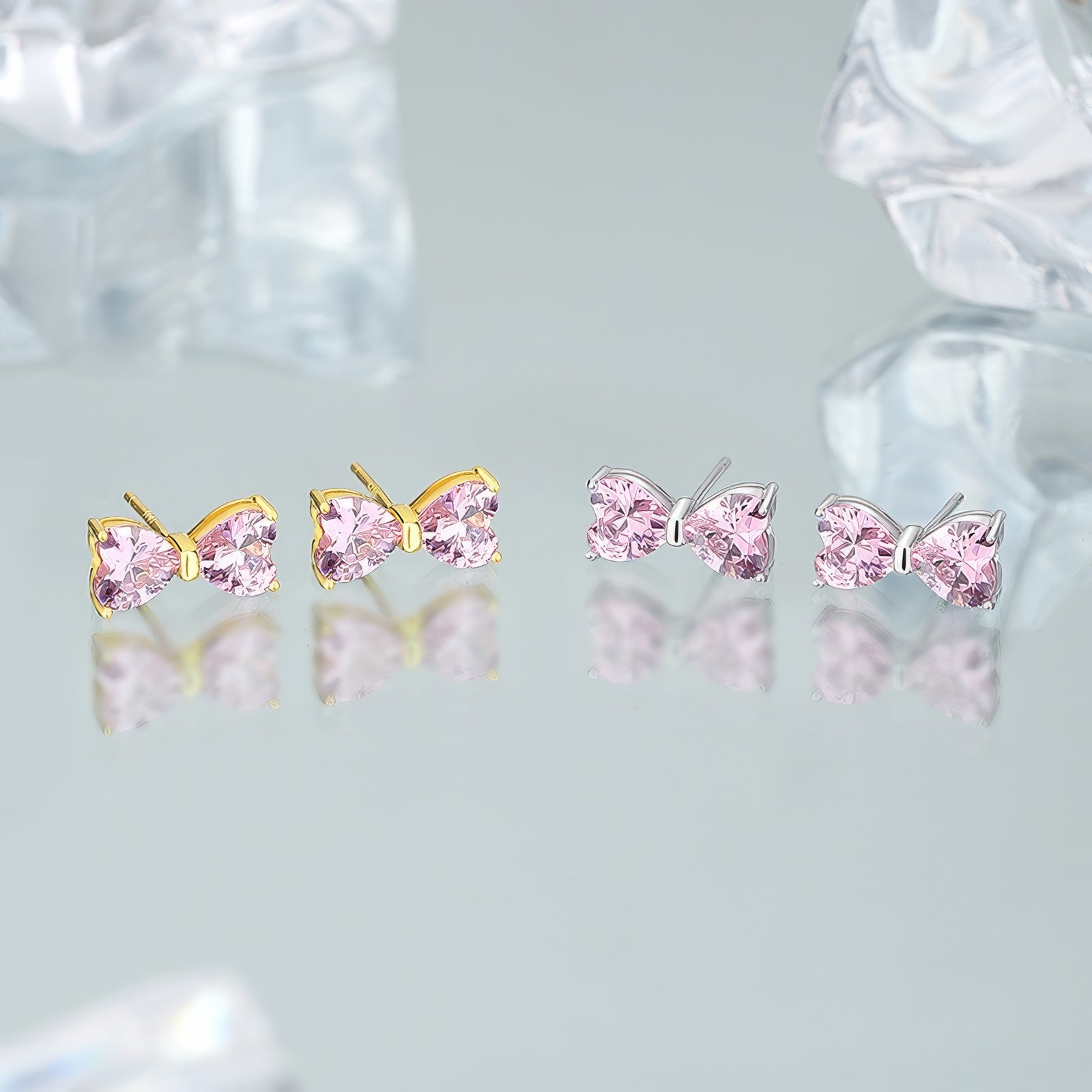 dainty gold plated bow shaped pink zirconia stone stud earrings