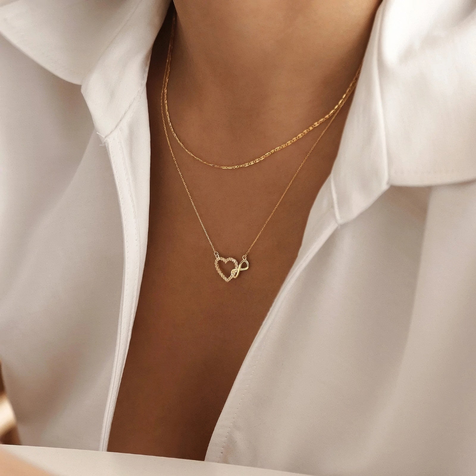 infinity heart adorned with crystals and polished infinity sign pendant necklace