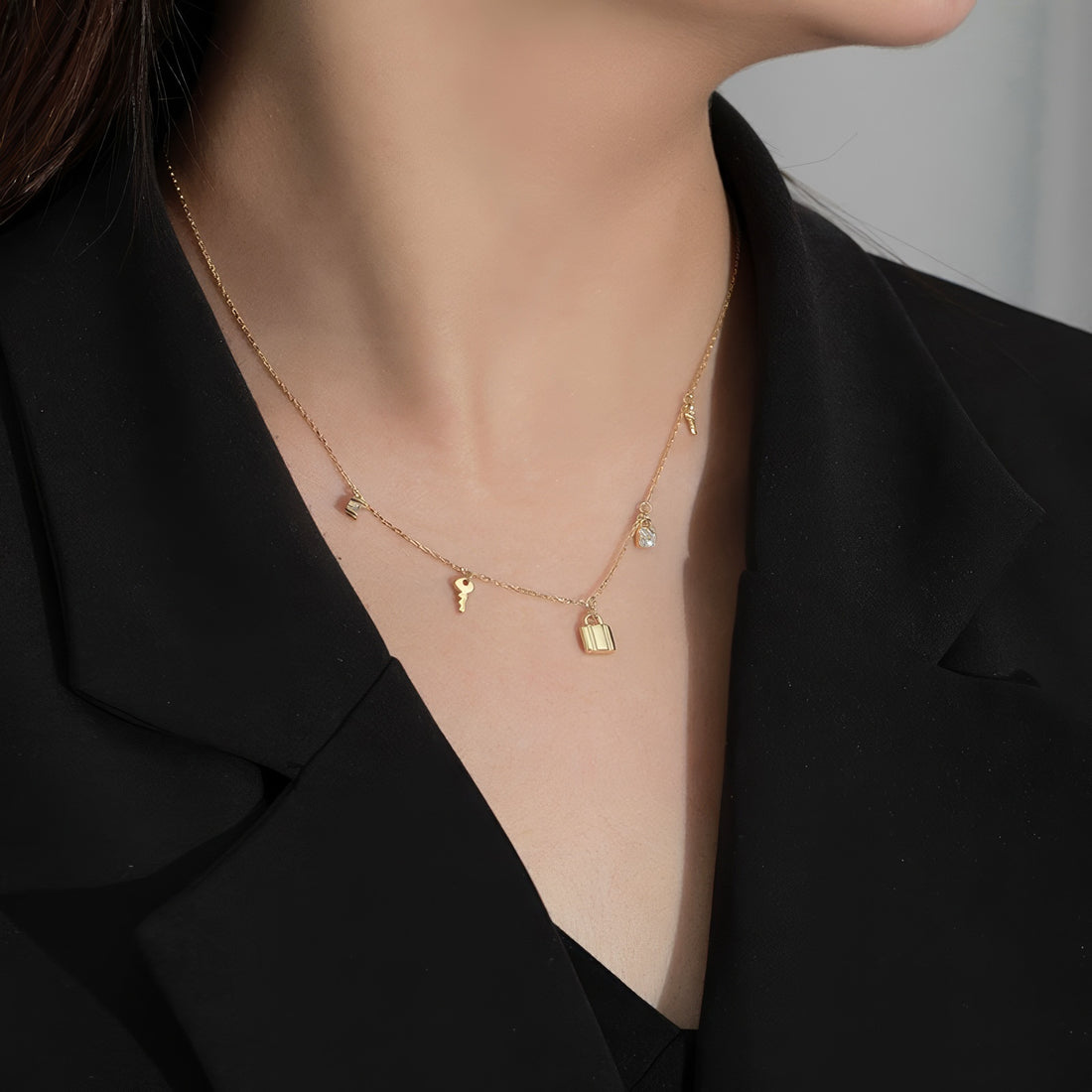 key and locker charms necklace with zirconia accents in gold plated
