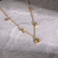 key and locker charms necklace with zirconia accents in gold plated