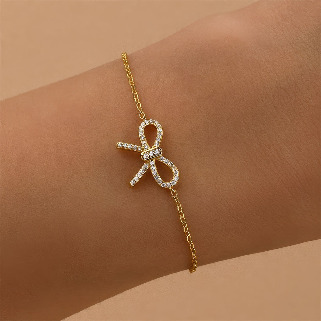 sparkling bow pendant cute chain bracelet in gold plated sterling silver