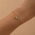 sparkling bow pendant cute chain bracelet in gold plated sterling silver