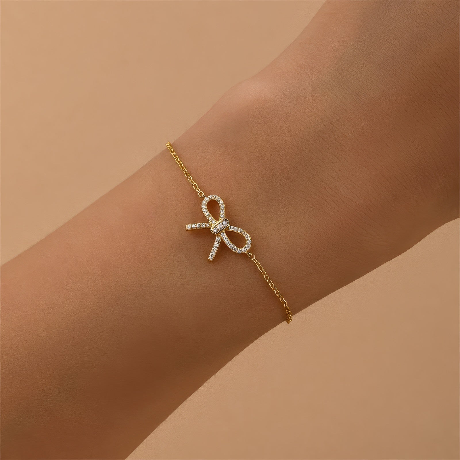 sparkling bow pendant cute chain bracelet in gold plated sterling silver