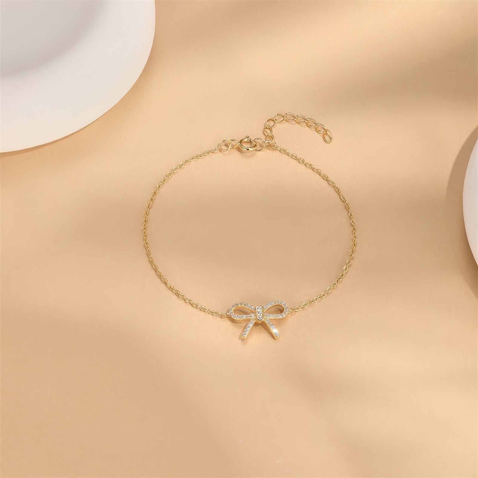 sparkling bow pendant cute chain bracelet in gold plated sterling silver