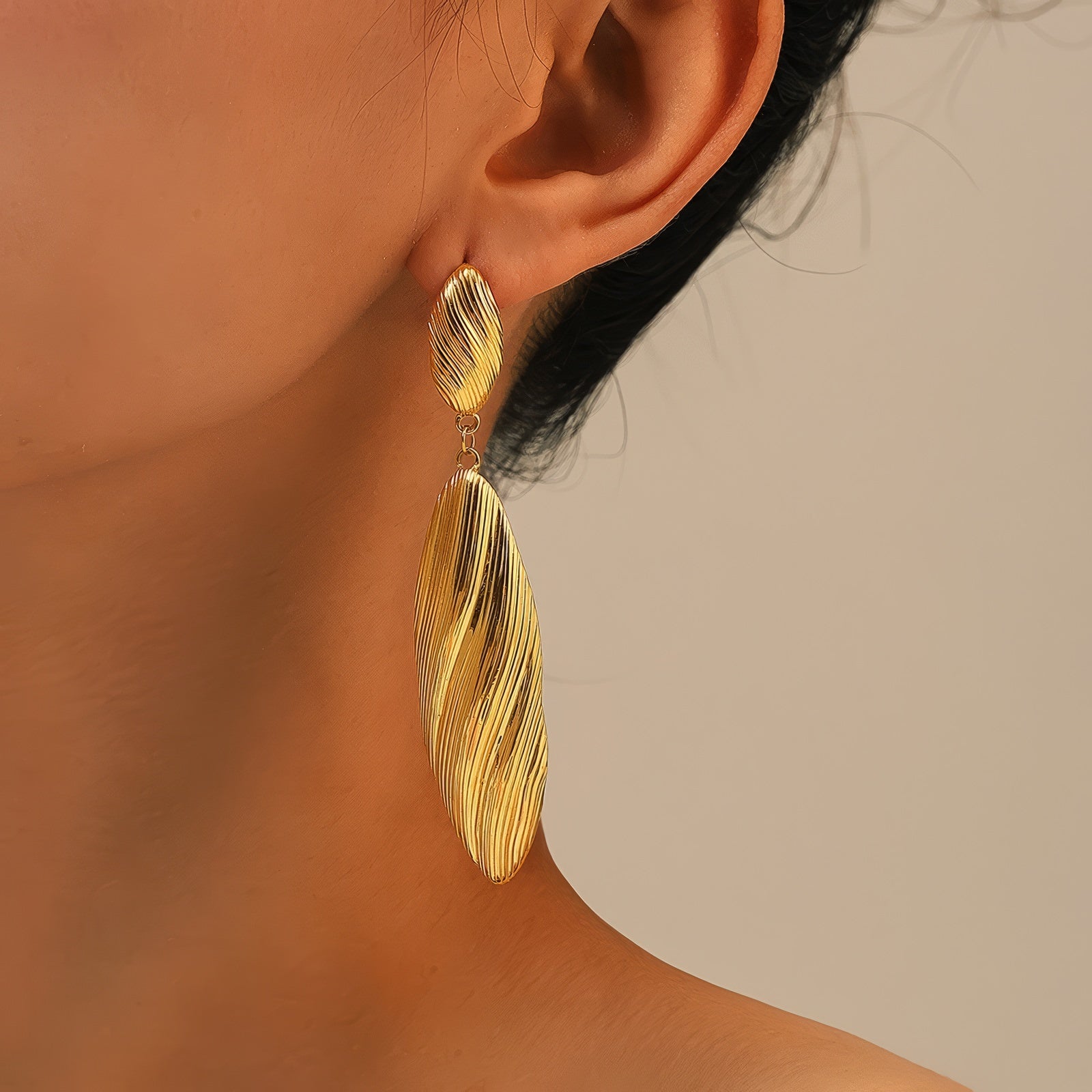 brushed texture long feather shaped gold plated dangle earrings