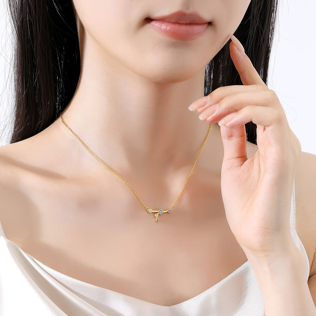 cancer constellation shaped necklace pendant made of multicolor cubic zirconia stones and gold plated sterling silver metal