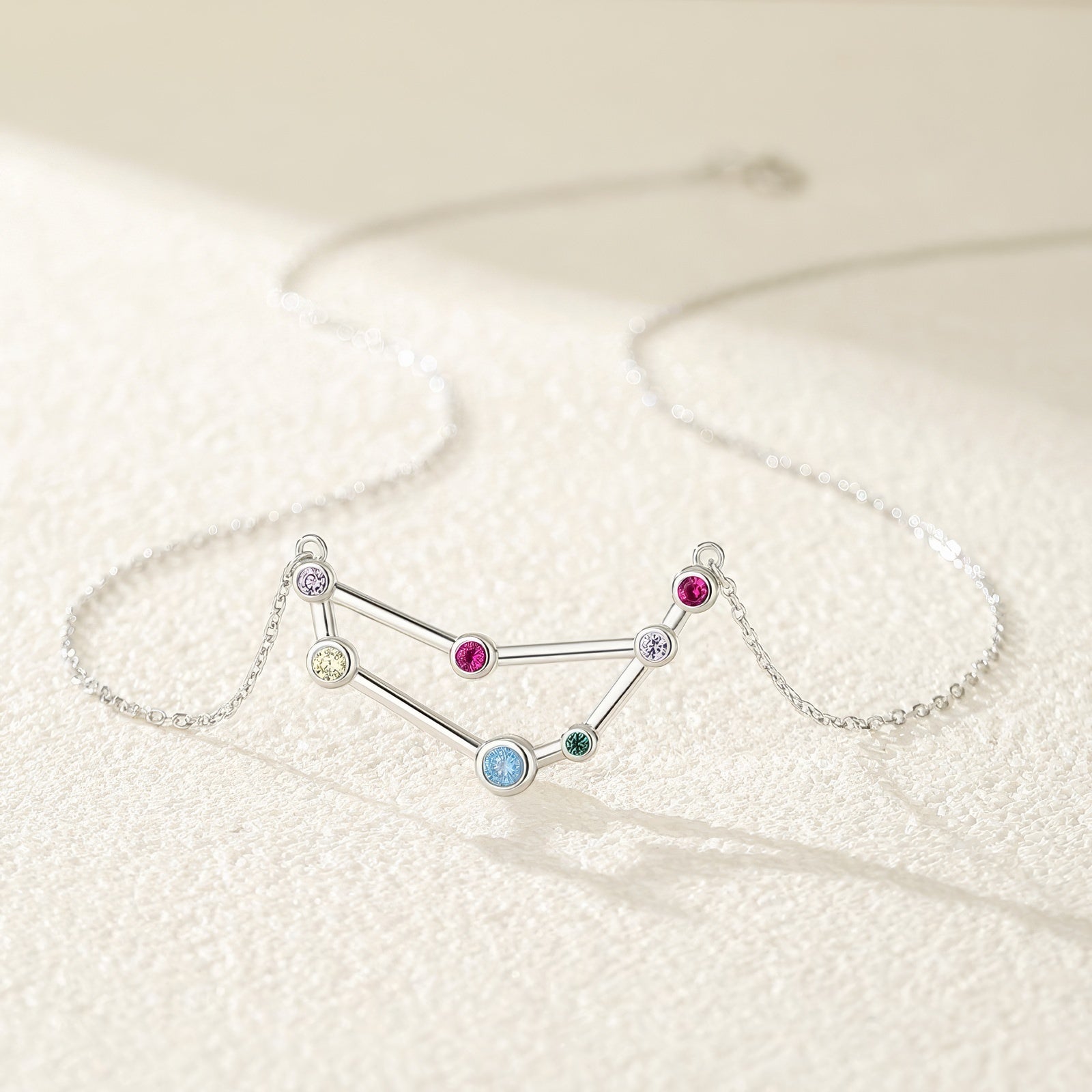 capricorn constellation shaped necklace pendant made of multicolor cubic zirconia stones and gold plated sterling silver metal