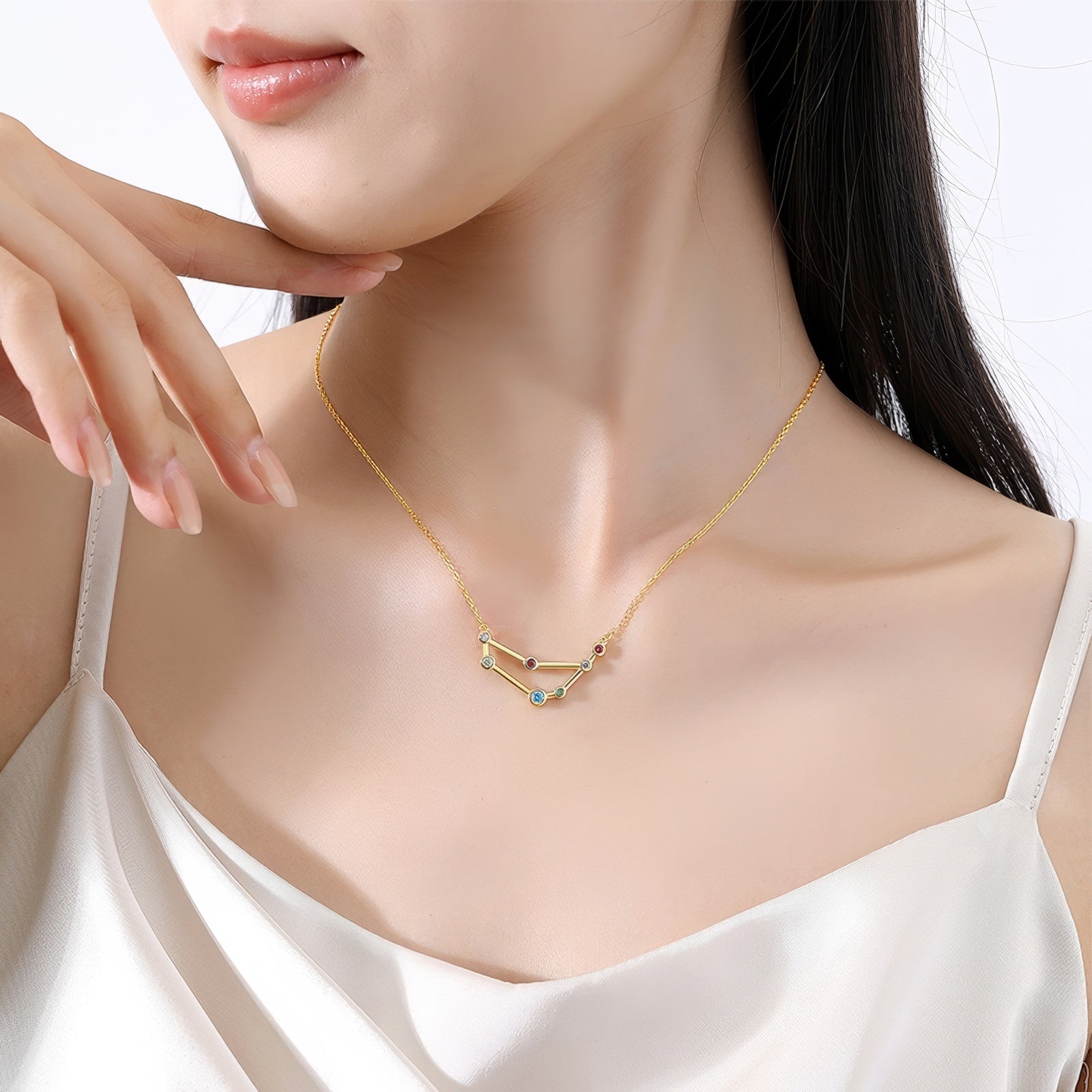 capricorn constellation shaped necklace pendant made of multicolor cubic zirconia stones and gold plated sterling silver metal
