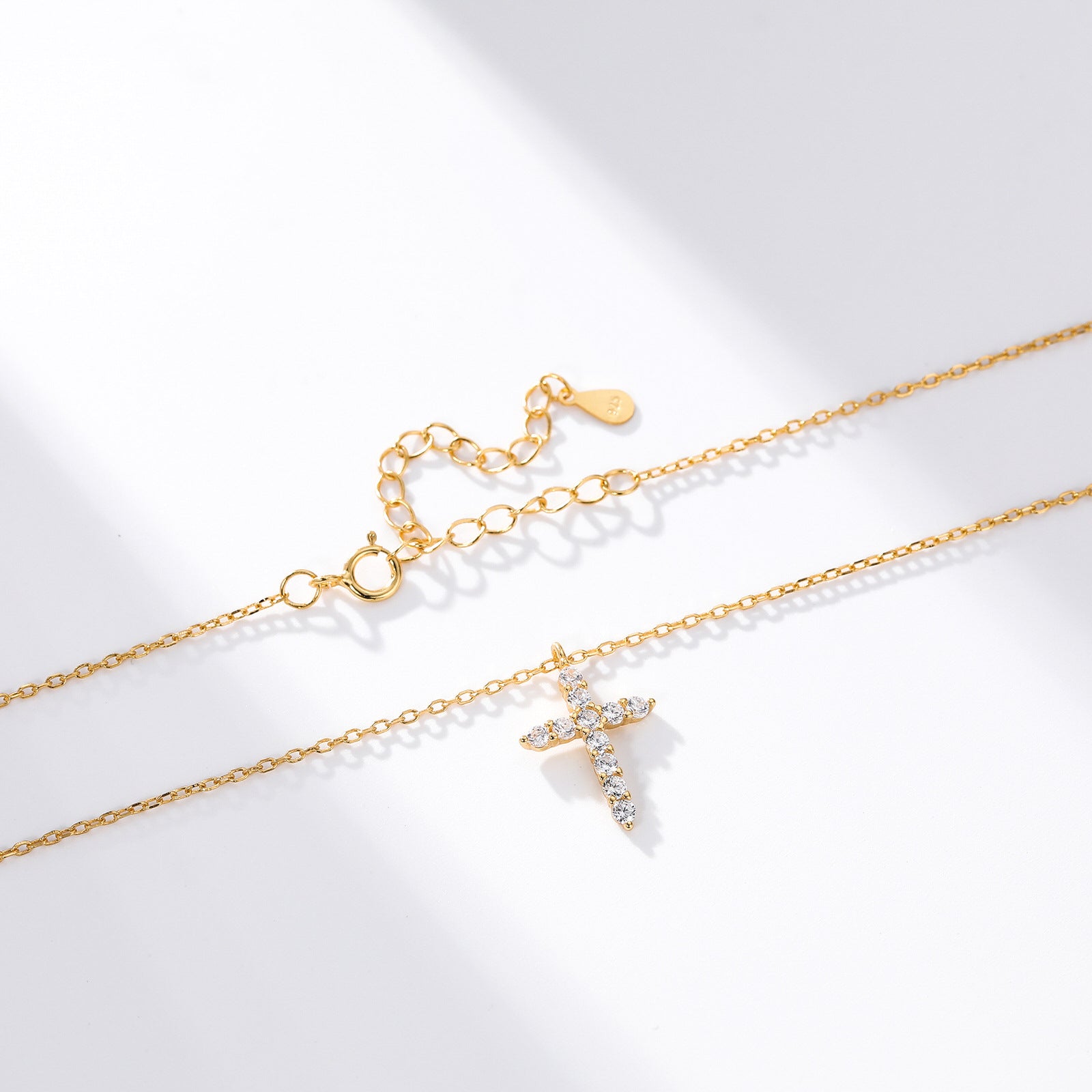 Gold plated sterling silver cross pendant necklace with clear zircon stones on fine chain, minimal design jewelry cross piece