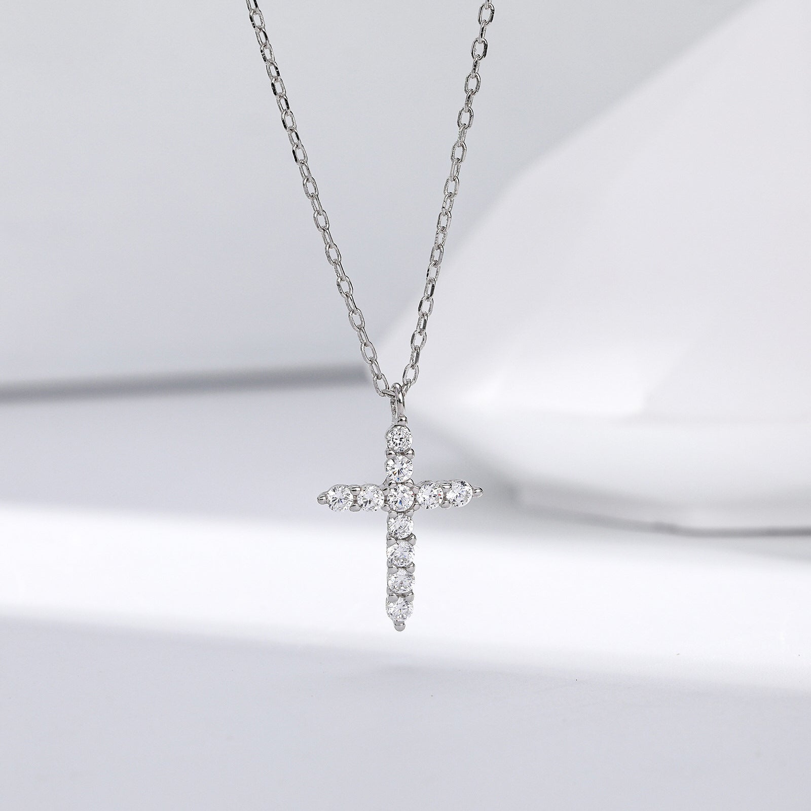 Gold plated sterling silver cross pendant necklace with clear zircon stones on fine chain, minimal design jewelry cross piece
