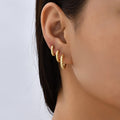 gold plated silver sculpted cable twisted huggie hoop earrings