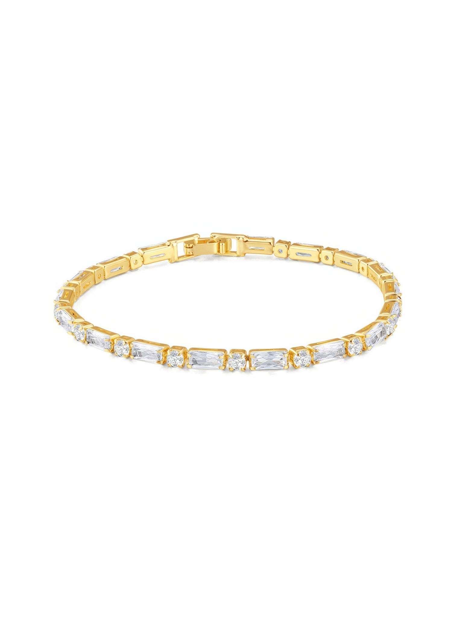 Gold tennis bracelet with alternating baguette and round zircon stones, 18K gold plated on copper, 3.5mm wide and 17cm long.