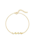 Gold bracelet with wave-shaped zircon design centerpiece on a sterling silver chain, finished with 18K gold plating.