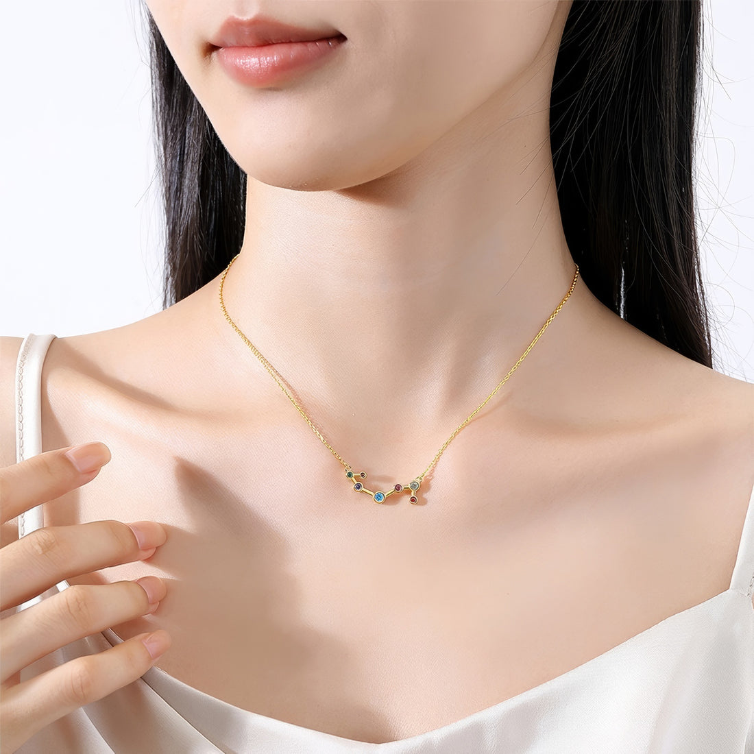 scorpio constellation shaped necklace pendant made of multicolor cubic zirconia stones and gold plated sterling silver metal