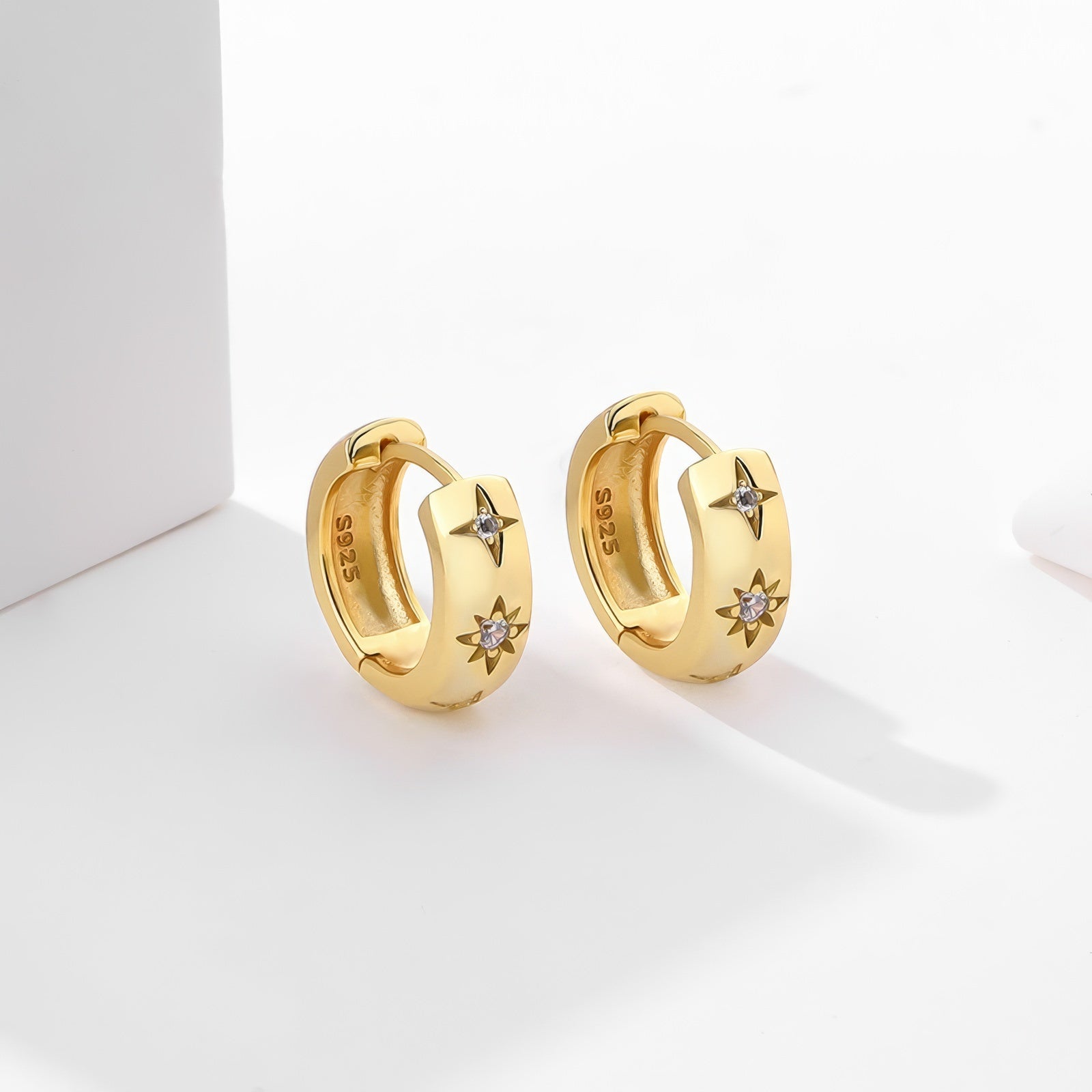 sterling silver engraved star with zirconia crystals gold plated hoop earrings 