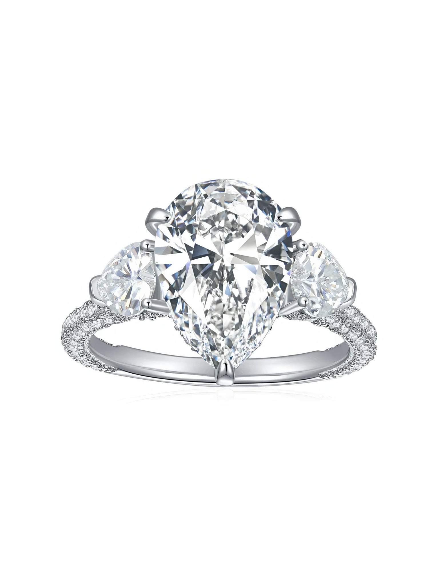 Sterling silver engagement ring with large pear-shaped moissanite center stone and heart-cut side stones, detailed with round moissanite on the band.
