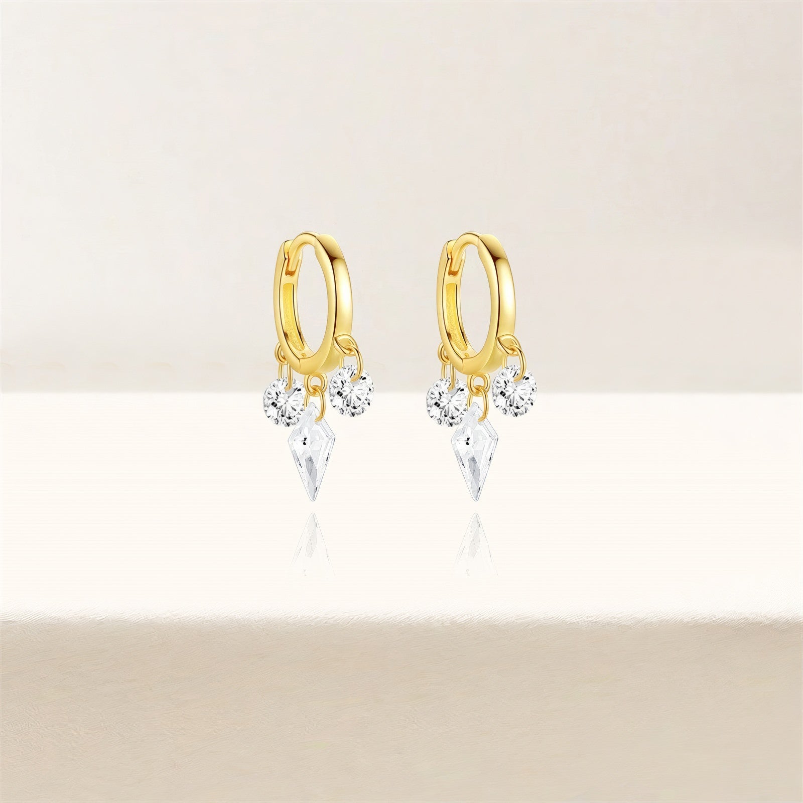 gold plated mini dangle hoop earrings with three crystals 