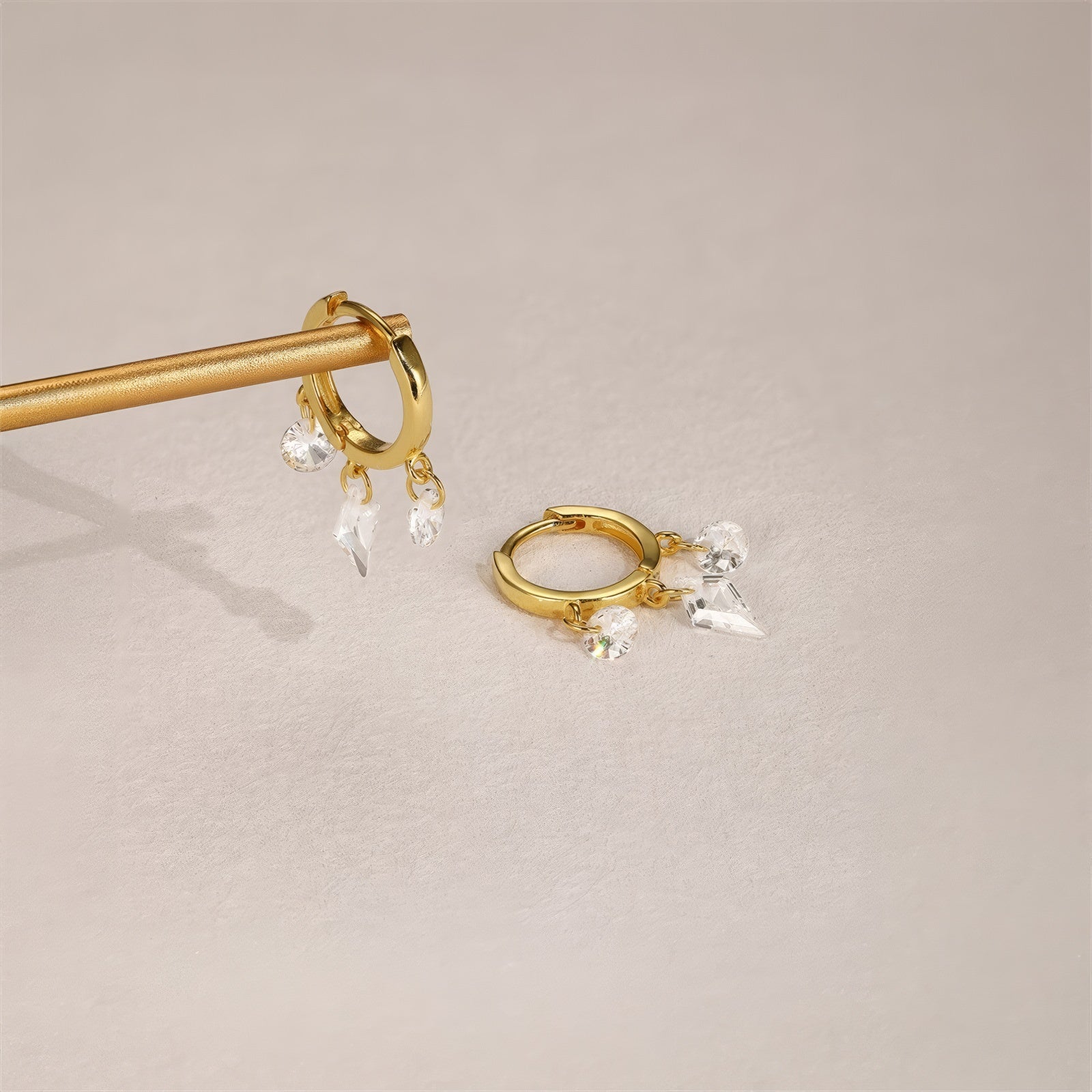 gold plated mini dangle hoop earrings with three crystals 