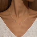 V-shape multicolor zirconia drop necklace in 925 sterling silver with 18K gold plating, adjustable chain, featuring red teardrop, pink baguette, marquise red, and purple square zirconia charms
